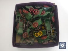 A box containing a quantity of vintage lead hand-painted horse and carts,