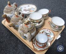 A tray of twenty-piece Japanese tea service and cup and saucer