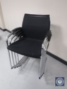 Four Sedus metal framed stacking office armchairs