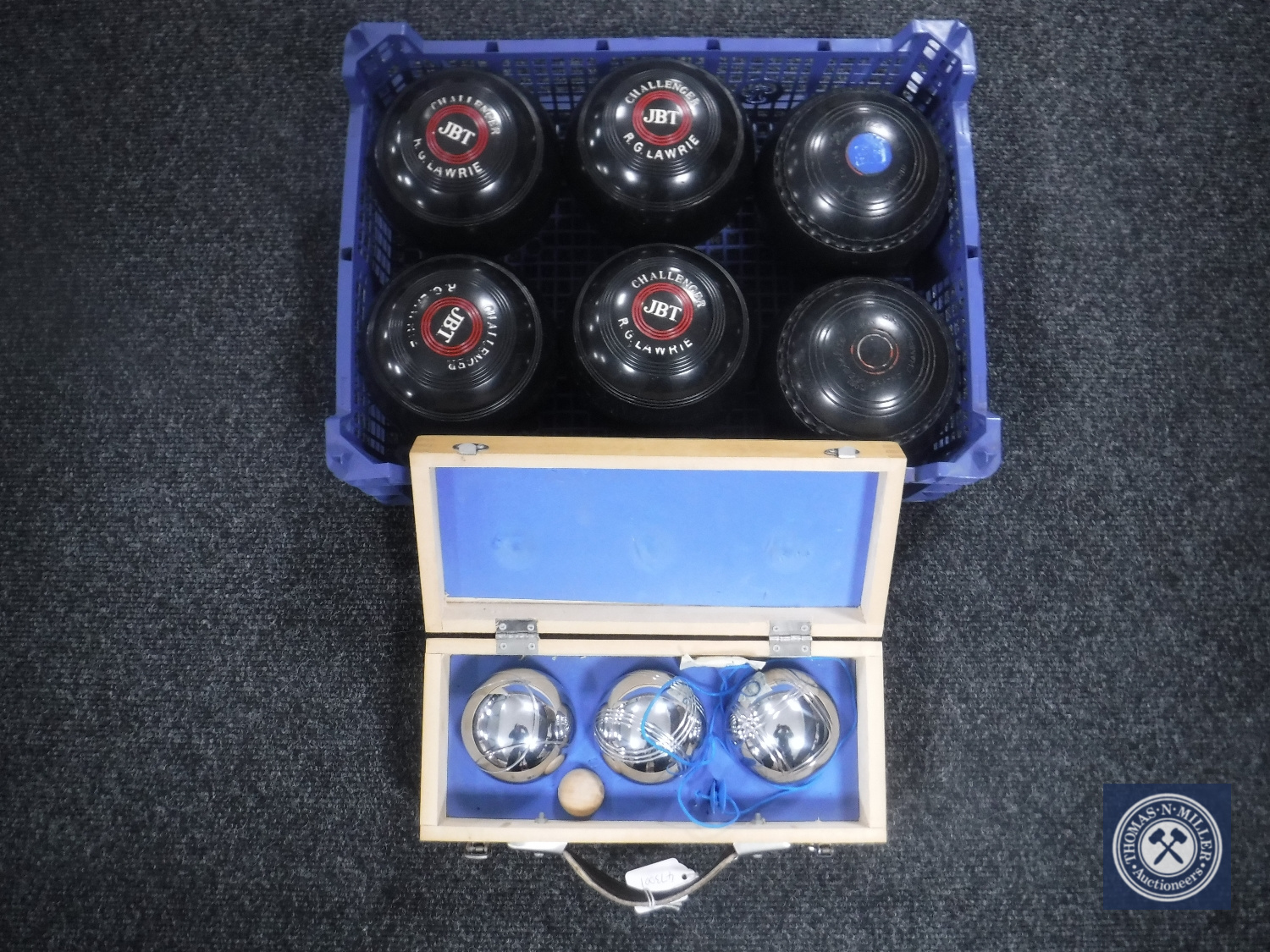 A box containing six composite bowls together with a case of French boules
