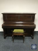 A mahogany cased over strung piano by Brasted of London plus piano stool