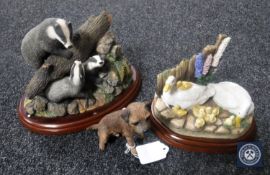 Three boxed Border Fine Art figures; badger family,