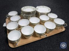 A tray containing twelve Aynsley china trios