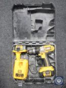 A cased Dewalt 18 volt electric drill with battery and charger