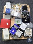 A tray containing assorted costume jewellery, simulated pearls,