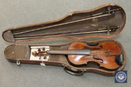 An antique violin, probably nineteenth century, two-piece back construction, length 13.
