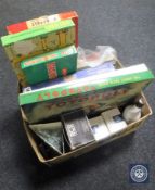 A box of vintage board games, jig saws, bottle of Malibu, two boxed Spode mugs,