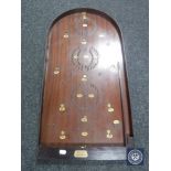 An Amersham Scora bagatelle board