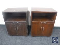 A pair of oak double door bedside cabinets