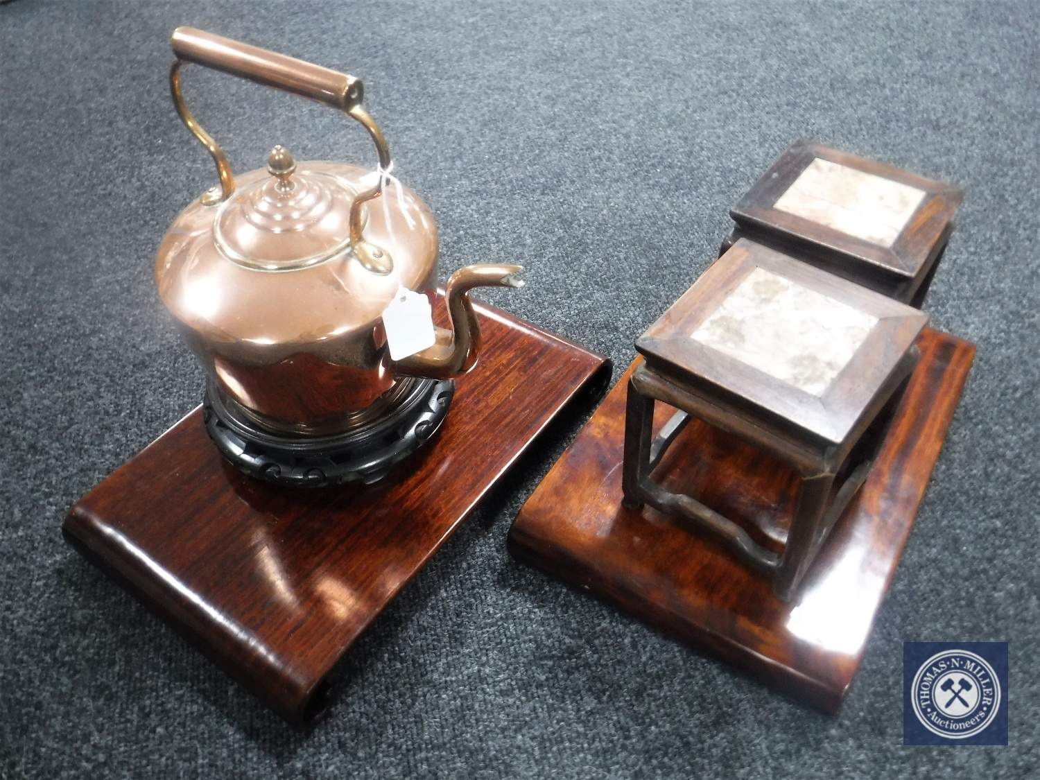 A Victorian copper kettle together with a pair of miniature Chinese hardwood marble topped tables,