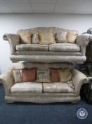 A pair of Medallion two seater settees with scatter cushions