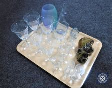A tray of antique etched glassware, two Holmegaard vases, glass cat,