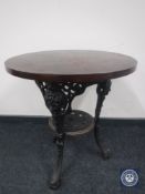 A cast iron Britannia bar table