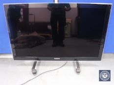 A Samsung 46 inch TV model number UE46B8000 with lead and remote (no table stand)