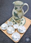 A tray of thirteen pieces of Royal Worcester Watteau china together with floral pottery jug on