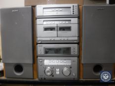 A Sony mini hi/fi component system with five speakers