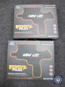 Two Regimental Police mini uzi electric guns