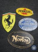 Four cast iron plaques; Ferrari, Pennzoil,
