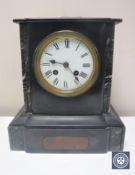 A Victorian slate and marble mantel clock with key