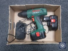 A Bosch Excel 18 volt electric drill with battery and charger