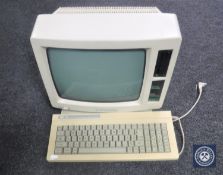 A vintage Amstrad personal computer word processor with keyboard