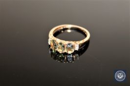 A 9ct gold green tanzanite and CZ ring, size O/P CONDITION REPORT: 2.