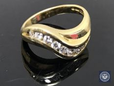 An 18ct gold eight-stone diamond ring,