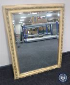 A gilt framed overmantel mirror