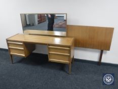 A five-piece A Younger & Company teak bedroom suite