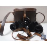 A pair of leather cased Steptron 8 x 30 field glasses by Ross of London.