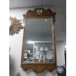 A 19th century walnut and parcel gilt Chippendale style mirror