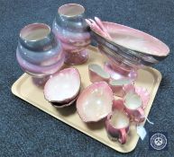 A tray of nineteen pieces of pink lustre china including milk jugs,