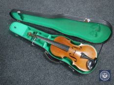 A full size violin in case with bow