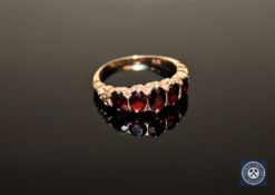 A 9ct gold five-stone garnet ring, size O CONDITION REPORT: 3.