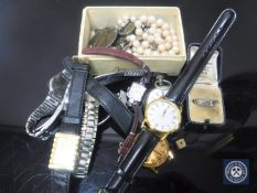 A tray of continental silver fob watch, lady's and gent's wristwatches,