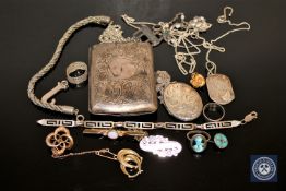 A collection of silver jewellery, cigarette case, lockets etc,