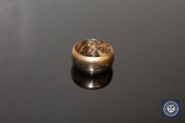A 9ct gold band ring, size P CONDITION REPORT: 8.