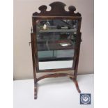 A George III walnut dressing table mirror