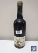A bottle of Taylor's 1960 Vintage Port, bottled in Oporto in 1963 by Taylor, Fladgate & Yeatman.