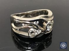 An 18ct gold six-stone diamond ring, the total diamond weight estimated at 1.