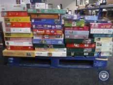 A large quantity of assorted jigsaws