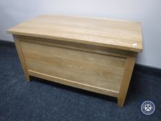 A contemporary oak blanket chest