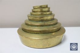 Seven 19th century graduated brass sovereign weights