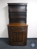 An oak linen fold dresser