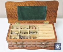 A jewellery box containing silver and yellow metal jewellery, cameo brooches,