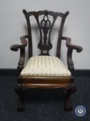 A reproduction child's Chippendale style armchair