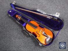 A 1/2 size violin in case