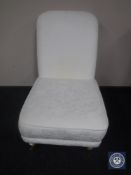 *****Lot Withdrawn from Auction - A bedroom chair in white floral cover.