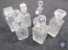 Six assorted cut glass and lead crystal decanters