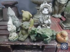 Seven assorted garden statues
